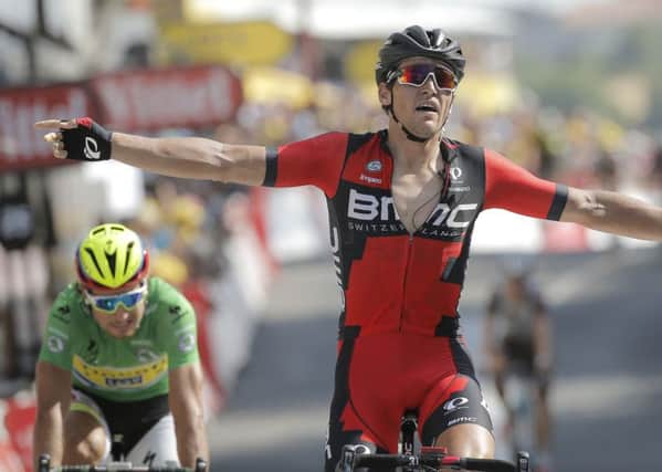Belgium's Greg van Avermaet celebrates crosses the finish line ahead of Peter Sagan of Slovakia in yesterday's 13th stage of the Tour de France.