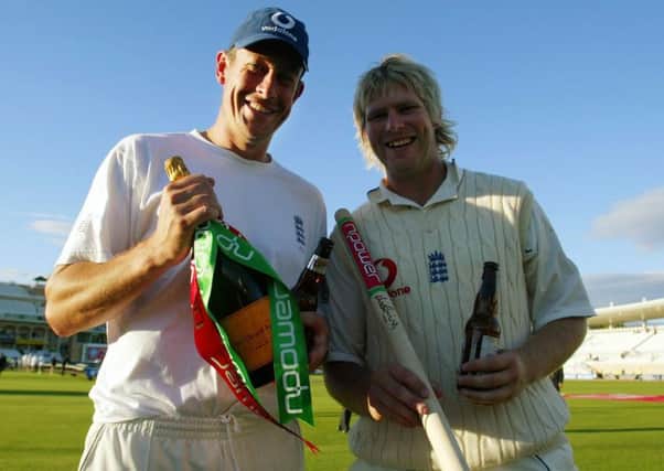 England's Ashley Giles, right, and Matthew Hoggard celebrate beating Australia on the fourth day of the fourth Test match at Trent Bridge, Nottingham in 2005.