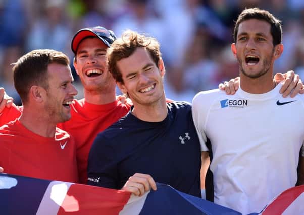 Great Britain's (left to right) Captain Leon Smith, Jamie Murray, Andy Murray and James Ward celebrate after defeating France in the Davis Cup quarter finals. Picture: Adam Davy/PA