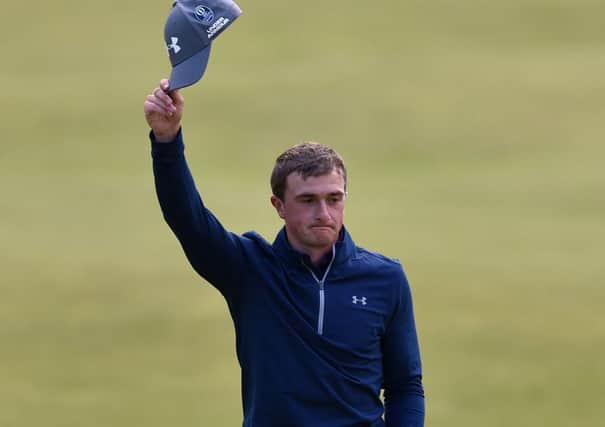 Ireland's Paul Dunne celebrates on the 18th during day four of The Open Championship 2015 at St Andrews, Fife.