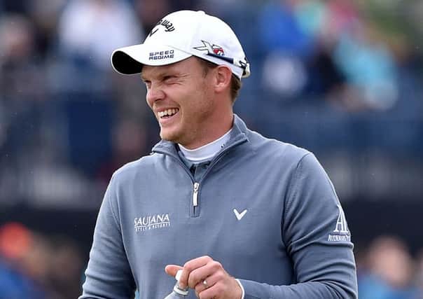 England's Danny Willett is all smiles a he walks the course during day four of The Open Championship 2015 at St Andrews, Fife. (Picture: Owen Humphreys/PA Wire). .