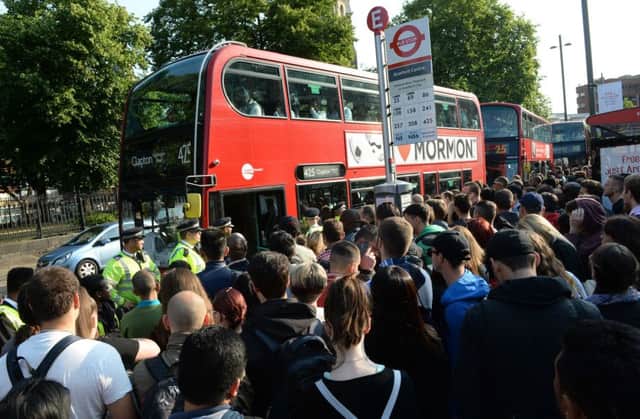 Militant misery: Chaotic scenes in London as strikes cripple transport systems and hold the public to ransom.