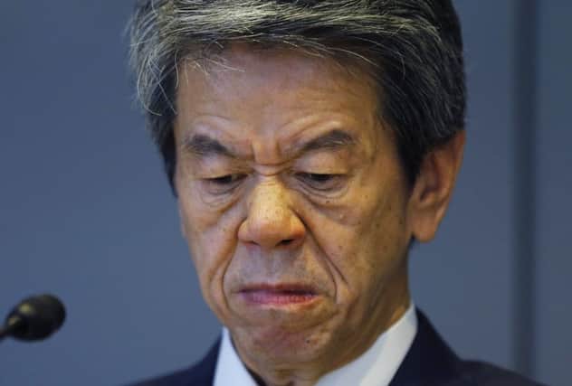 Toshiba Corp. CEO Hisao Tanaka during a press conference to announce his resignation at the company's headquarters in Tokyo