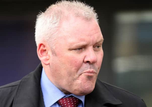 Richard Barklie, 50, has been banned from football matches for five years for racially abusing and shoving a black commuter off a Paris Metro train.
