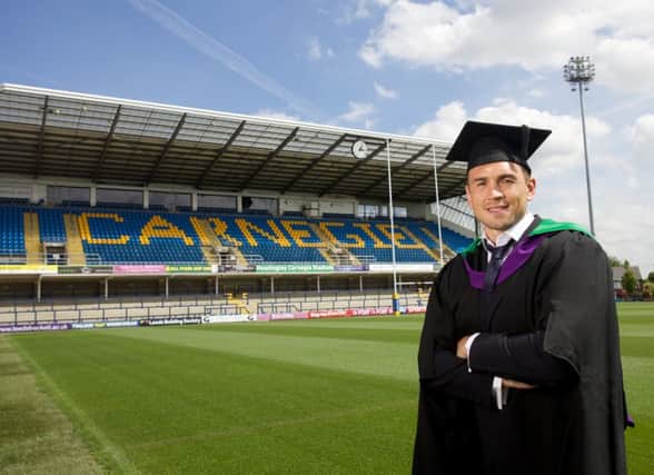 Kevin Sinfield in his Post Graduation gown at Headingley Carnegie Stadium. Picture by Vicky Matthers
