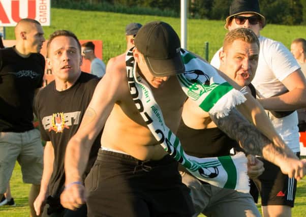 Frankfurt and Leeds fans clash after Tuesday's friendly in Eugendorf. Photo: PA Wire