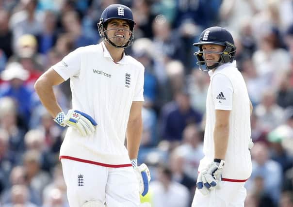England's Alastair Cook and Adam Lyth, right.