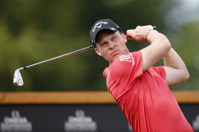 Sheffield's Danny Willett tees off during the first round of the Omega European Masters in Crans-Montana, Switzerland(Picture: Peter Klaunzer/Keystone via AP).