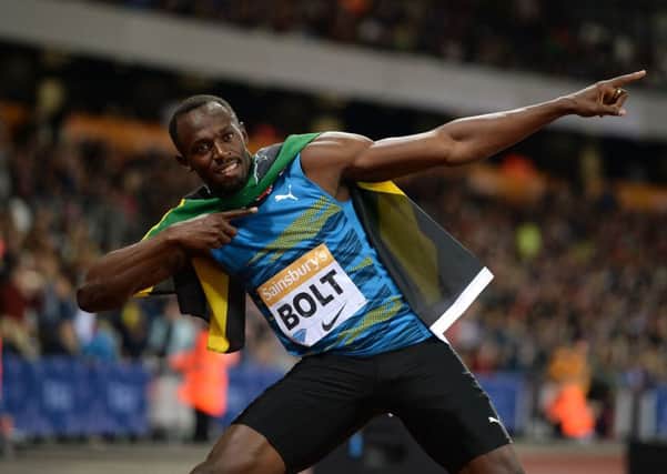 Jamaica's Usain Bolt celebrates winning the Men's 100m Final at day one of the Sainsbury's Anniversary Games.