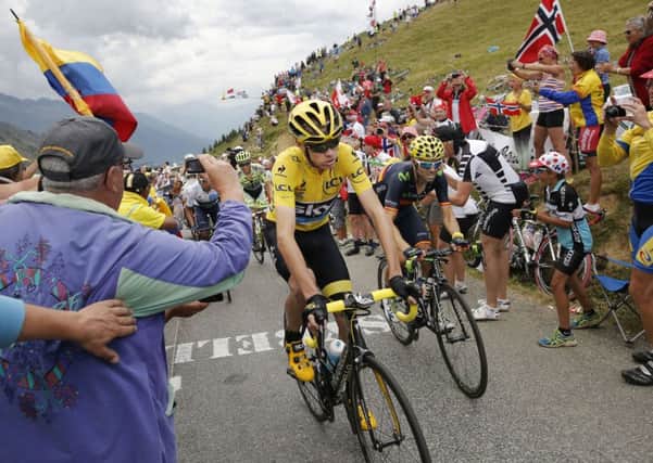 Britain's Chris Froome climbs Croix de Fer pass during the 19th stage of the Tour de France yesterday. Picture: AP/Laurent Cipriani.