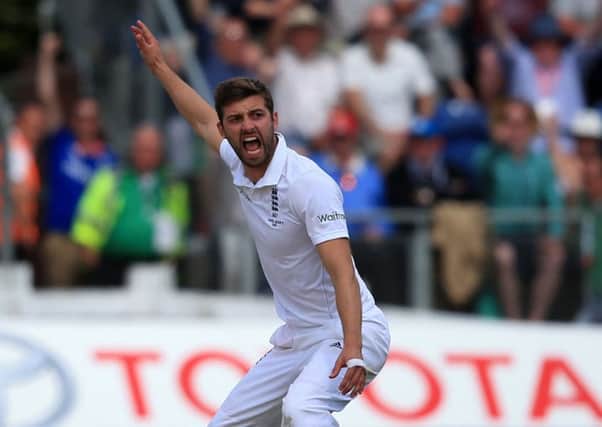 Mark Wood celebrates trapping Australia batsman Shane Watson leg before during the First Ashes Test in Cardiff (Picture: PA).