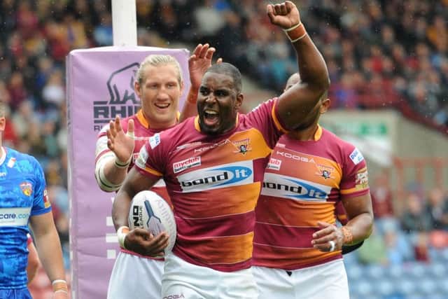 DELIGHTED: Huddersfield Giants Michael Lawrence celebrates scoring a try in the Super League win over Wakefield Trinity Wildcats. Picture: Anna Gowthorpe.