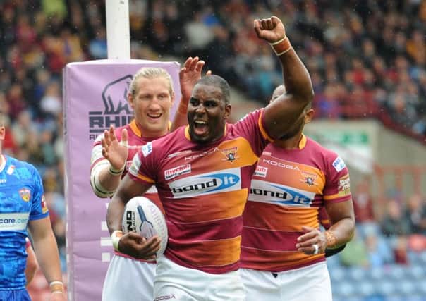 DELIGHTED: Huddersfield Giants Michael Lawrence celebrates scoring a try in the Super League win over Wakefield Trinity Wildcats. Picture: Anna Gowthorpe.