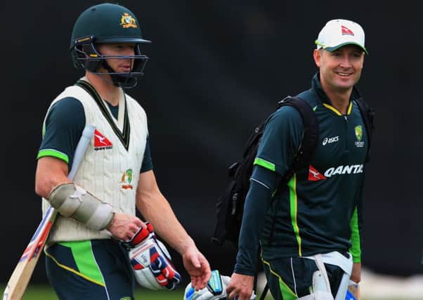 Australia captain Michael Clarke, right, chats with team-mate Chris Rogers during the nets session at Edgbaston