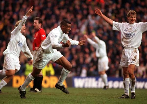 All smiles for Brian Deane as he celebrates his goal against Manchester United with Tomas Brolin and Richard Jobson.