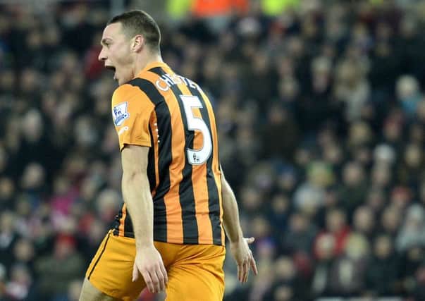 Hull City's James Chester celebrates his goal during the Barclays Premier League match at the Stadium of Light, Sunderland. PRESS ASSOCIATION Photo. Picture date: Friday December 26, 2014. See PA story SOCCER Sunderland. Photo credit should read: Owen Humphreys/PA Wire. RESTRICTIONS: Editorial use only. Maximum 45 images during a match. No video emulation or promotion as 'live'. No use in games, competitions, merchandise, betting or single club/player services. No use with unofficial audio, video, data, fixtures or club/league logos.