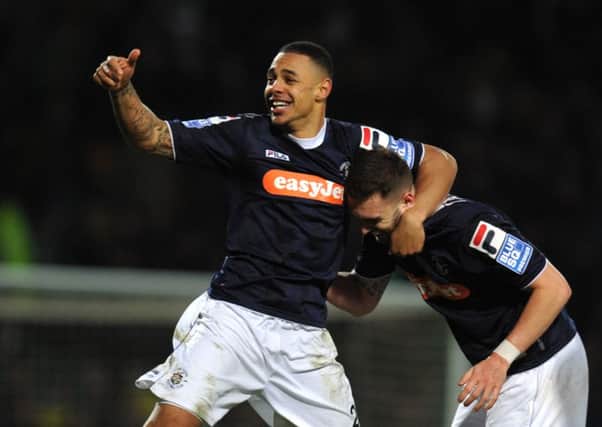 Andre Gray, celebrating scoring for Luton, is a target of interest by Hull City.