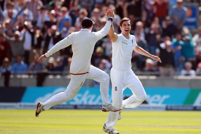 England's Steven Finn celebrates taking the wicket of Australia's Adam Voges. Picture: David Davies/PA.