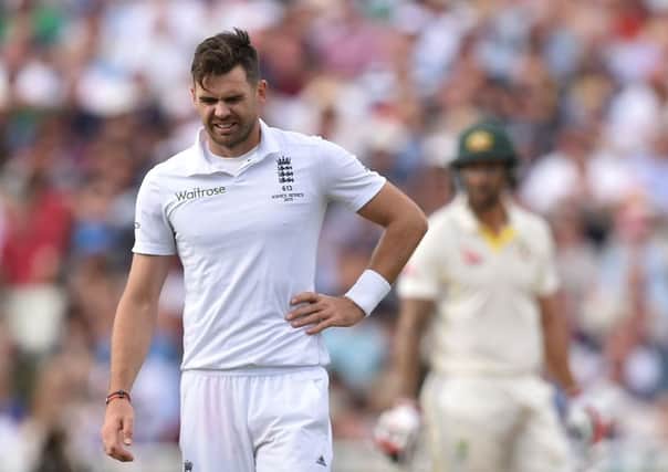 England's James Anderson leaves the field with a side injury during day two. Picture: Joe Giddens/PA