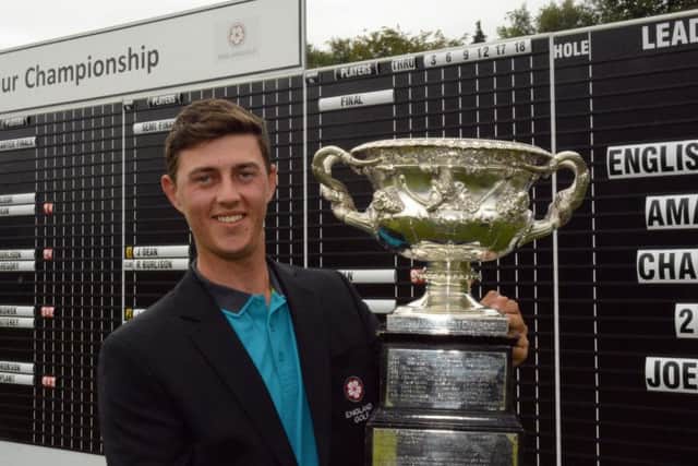 Sheffield's Joe Dean with the English Men's Amateur championship trophy after winning the final at Alwoodley GC (Picture: Chris Stratford),