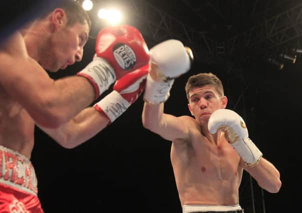 Luke Campbell attacks Tommy Coyle in their all-Hull bout.