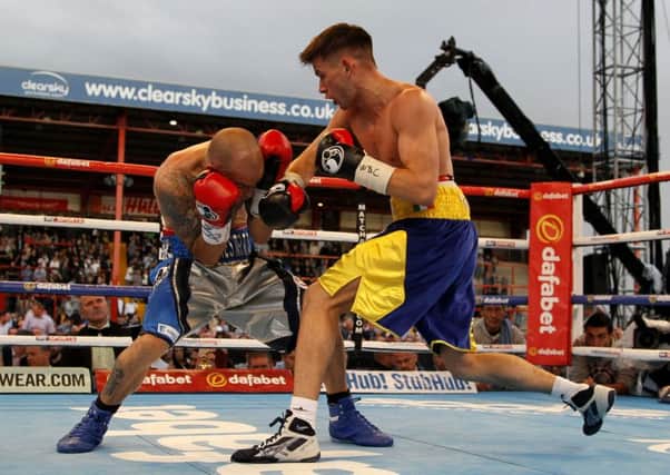 Martin Ward (right) in action against Sergio Blanco during their WBC International Super Feathrweight title contest.