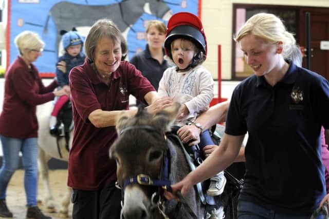 Meade, two, and  Erin Horn, three, taking part in one of the centre's activities.
Picture: Bruce Rollinson