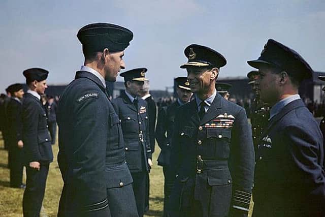 King George VI talking to Squadron Leader Les Munro