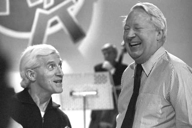 Edward Heath and Jimmy Savile rehearsing for an episode of Jim'll Fix It