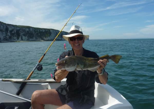 Stewart Calligan with a 5lb cod, one of several species caught in deeper water off the East Coast.