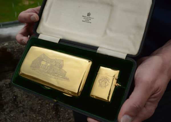 The 18-carat gold engraved cigar and matchbox cases given to Leeds GC co-founder William Penrose-Green by grateful members (Picture: Chris Stratford).