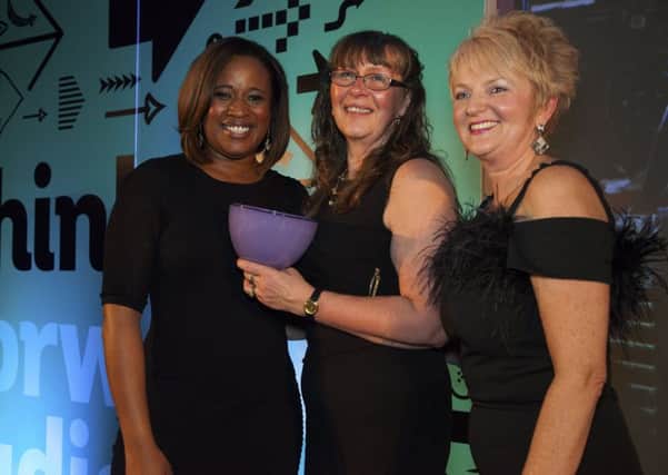Centre stage: From left, Charlene White, with Anne Wilson, last years winner of Business Woman of the Year, and Debra White, regional director of small businesses at HSBC.