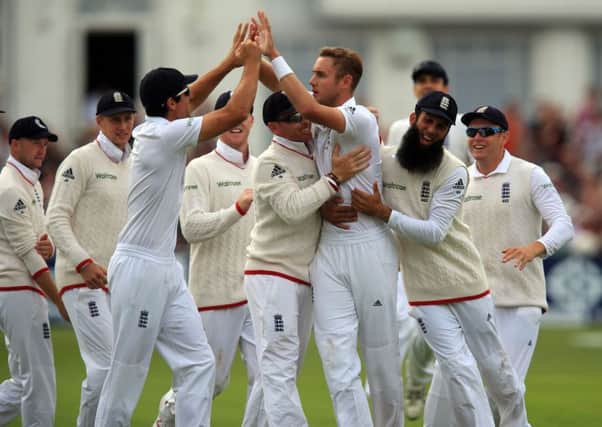 England's Stuart Broad celebrates the wicket of Australia's Chris Rogers during day one of the Fourth Investec Ashes Test at Trent Bridge, Nottingham. (Pictures: Mike Egerton/PA Wire)