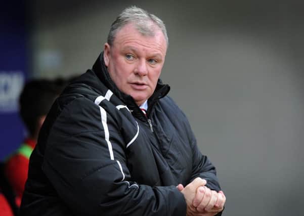Rotherham United manager Steve Evans will look for his side to defy the doom-and-gloom merchants who predict they will go down (Picture: Bruce Rollinson).
