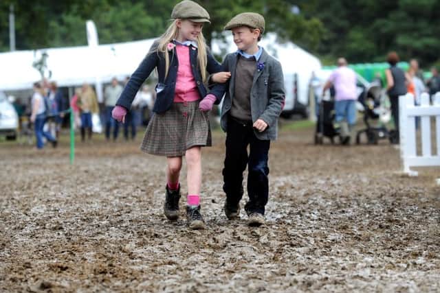 Heidi Drummond, 8, with her brother Bill from Wensleydale, at the CLA Game Fair at Harewood House. Picture by Simon Hulme