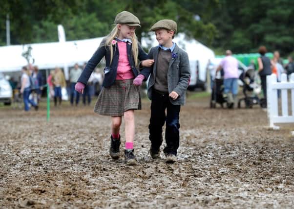 Heidi Drummond, 8, with her brother Bill from Wensleydale, at the CLA Game Fair at Harewood House. Picture by Simon Hulme