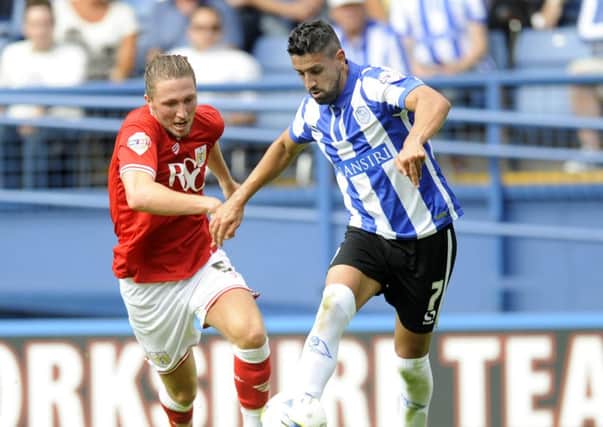 Marco Matias gets away from City's Luke Ayling