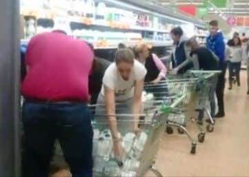 Milk protesters at Asda in Harrogate. Picture: BBC Look North