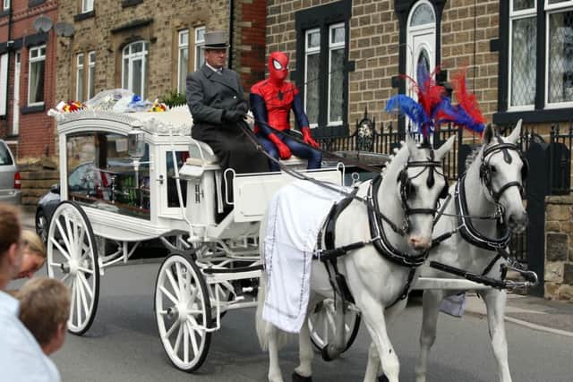 The coffin of seven year old Conley Thompson arriving at St Thomas and St James Church in Worsbrough Dale