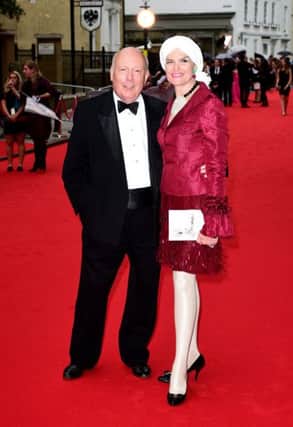 Julian Fellowes and Emma Joy Kitchener attending a BAFTA tribute evening for Downton Abbey held at The Richmond Theatre, London. PRESS ASSOCIATION Photo. Picture date: Tuesday August 11, 2015. Photo credit should read: Ian West/PA Wire
