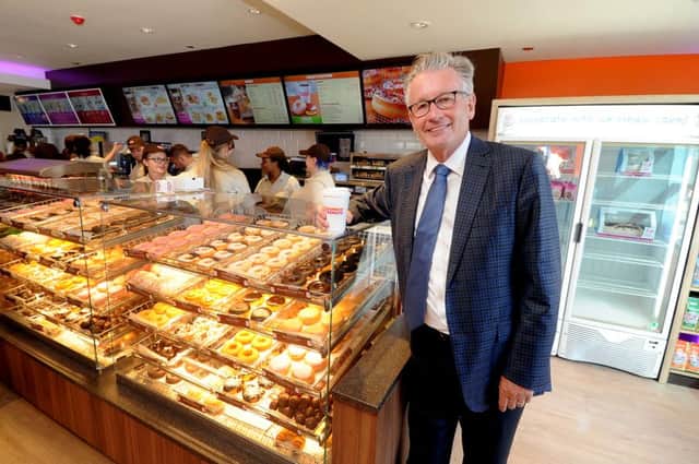 Date:  12th August 2015. Picture James Hardisty, (JH1009/78a)  Nigel Travis, CEO of Dunkin Brands, at the opening of the first ever Dunkin Donuts store in the UK outside of London on Woodhouse Lane, Leeds, next to the Pryzm Nightclub.