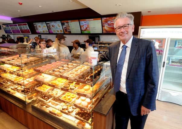 Date:  12th August 2015. Picture James Hardisty, (JH1009/78a)  Nigel Travis, CEO of Dunkin Brands, at the opening of the first ever Dunkin Donuts store in the UK outside of London on Woodhouse Lane, Leeds, next to the Pryzm Nightclub.