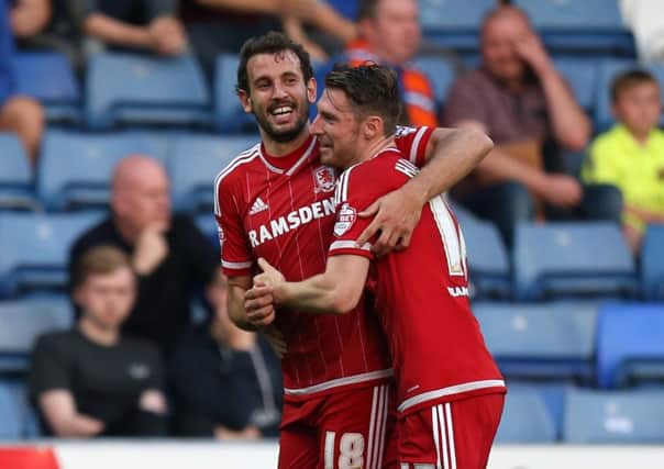 Middlesbrough's Christian Stuani (left) celebrates scoring his side's second goal with team-mate James Husband.