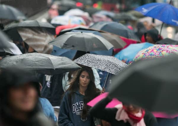 Torrential downpours and thunderstorms are expected to sweep in from the south. Pic: PA Wire.