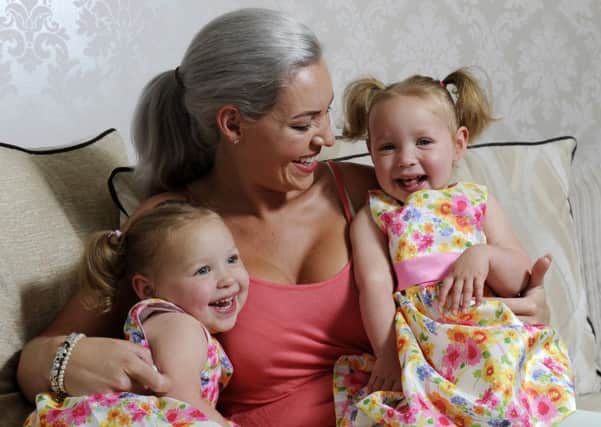 Natalie Foxcroft with her "miracle" identical twins Heidi and Halle