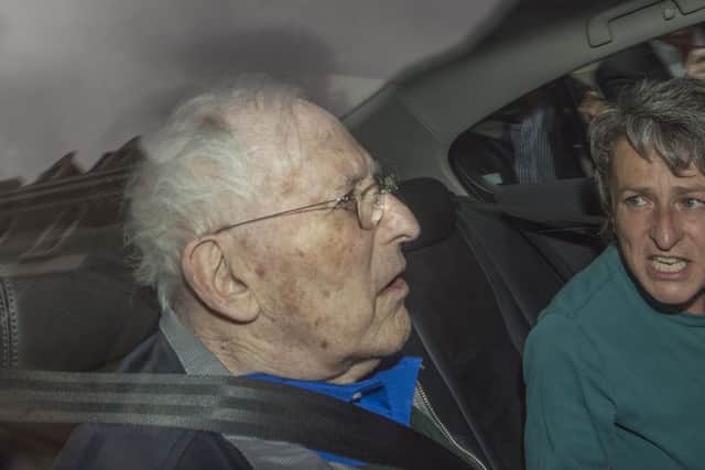 Lord Janner leaves Westminster Magistrates Court in London by car after appearing over 22 historic child sex abuse charges.