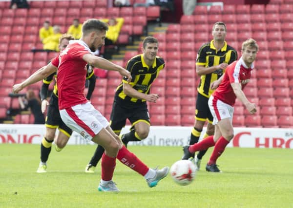 Conor Hourihane scores for Barnsley from the penalty spot.