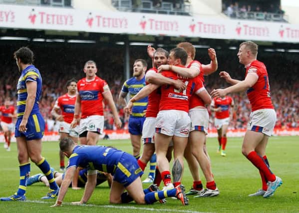 Hull Kr's Shaun Lunt celebrates with teammates after scoring Hull KR's wining try during the Challenge Cup semi-final match at Headingley Carnegie Stadium, Leeds.