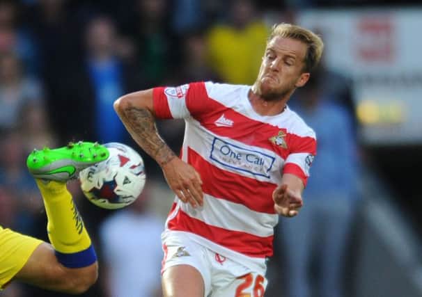 Doncaster Rovers' James Coppinger had a penalty appeal turned down at the DW Stadium.
