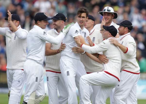 England's Steven Finn celebrates another Australian wicket.